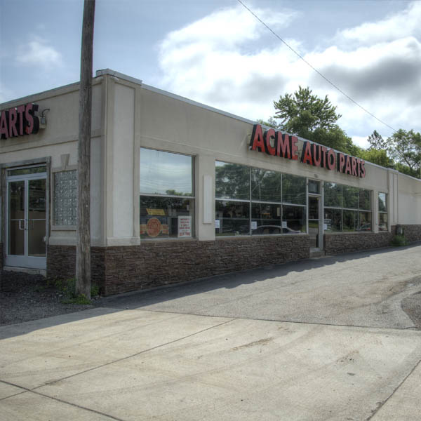 The ACME Auto Parts storefront on Cesar E Chavez Ave in Pontiac, Michigan